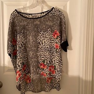 Chloe k medium blouse floral print hem comes up in front